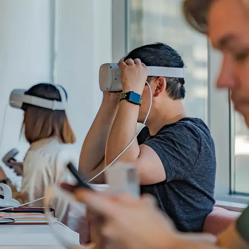 Technology team wearing VR headsets