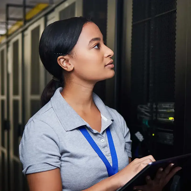 Female employee checking on cloud servers