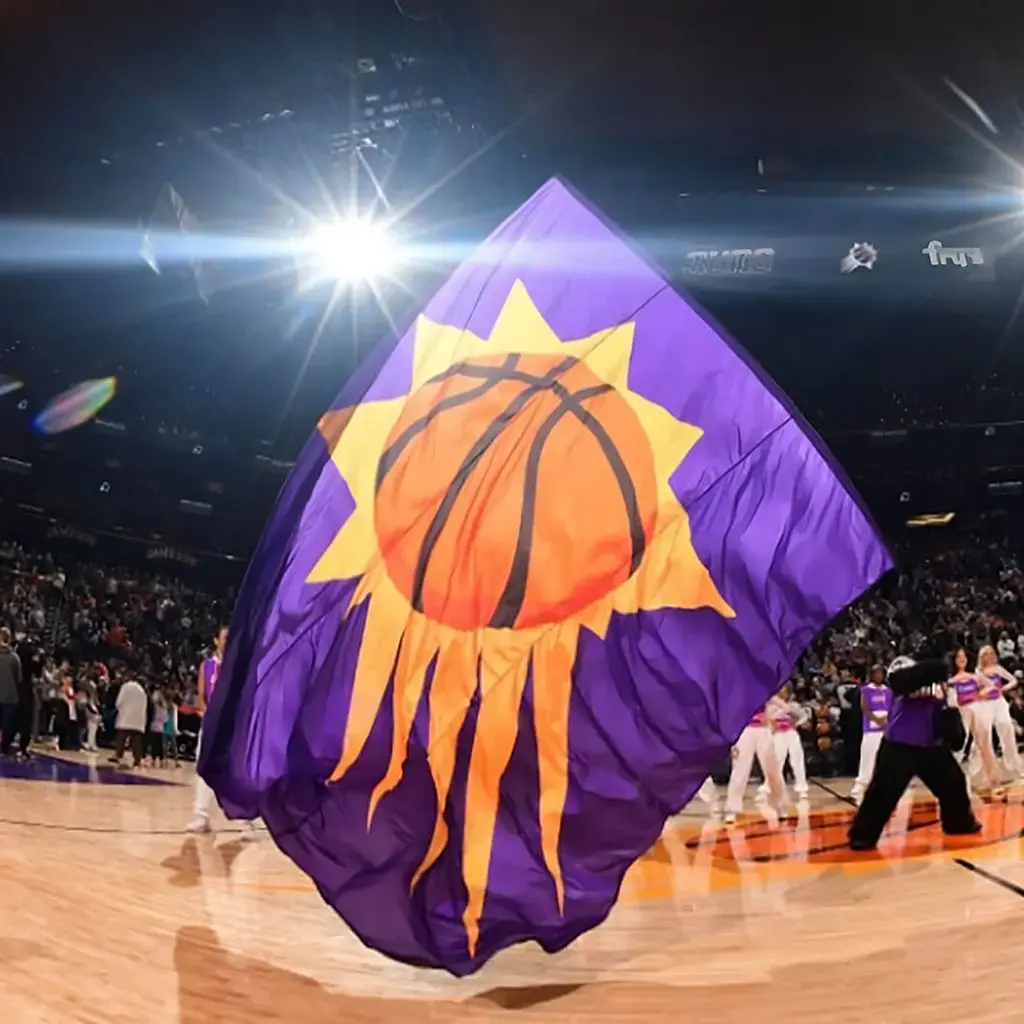 A person waving the Phoenix Suns basketball club flag in the middle of the basketball court