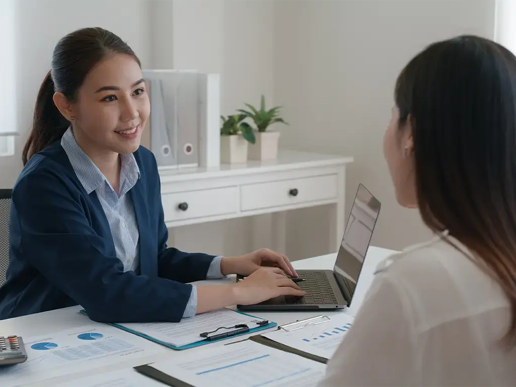 asian-business-woman-laptop-spreadsheets-marketing-hero