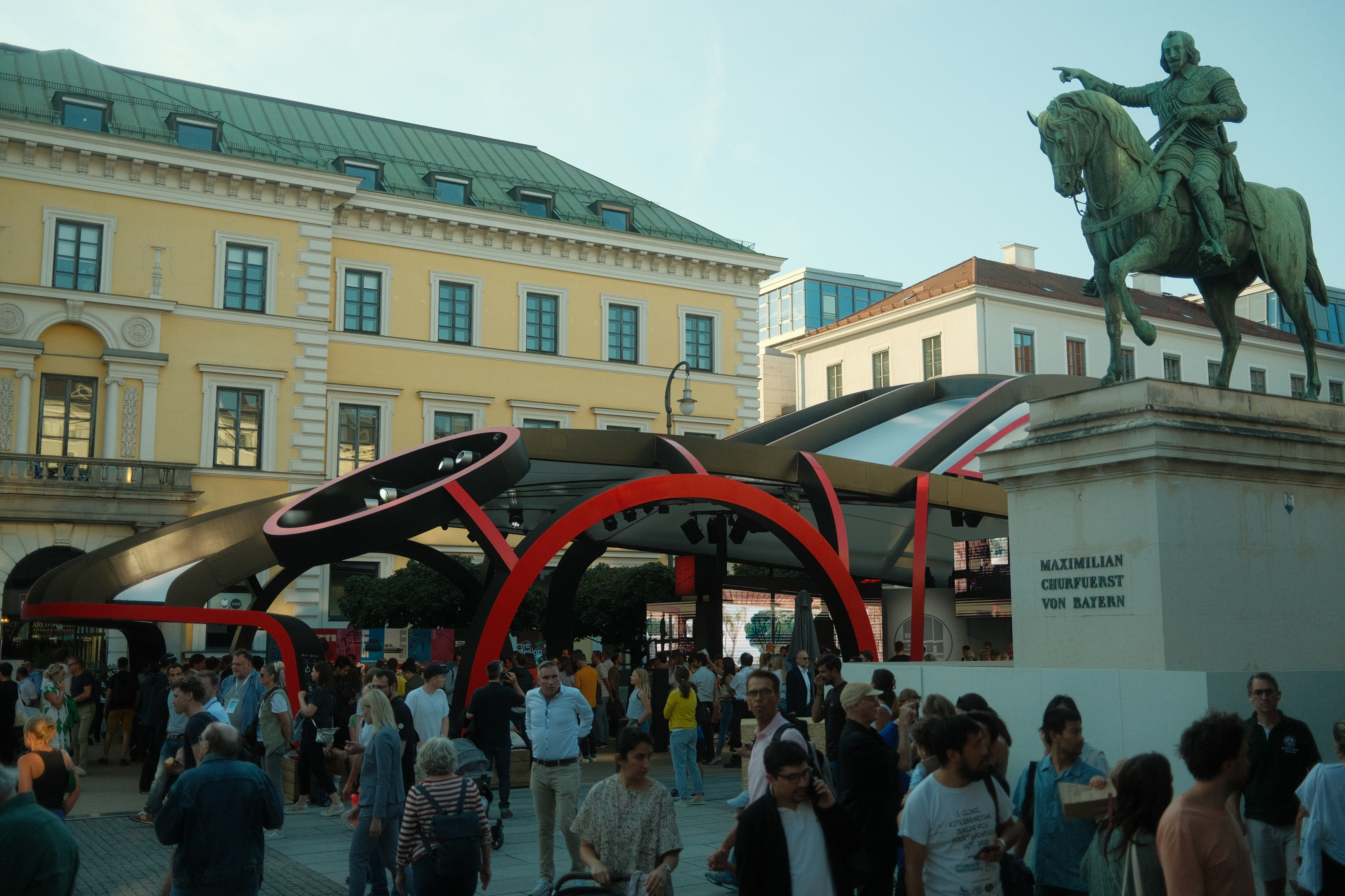 European city with people mingling in an outdoor space 