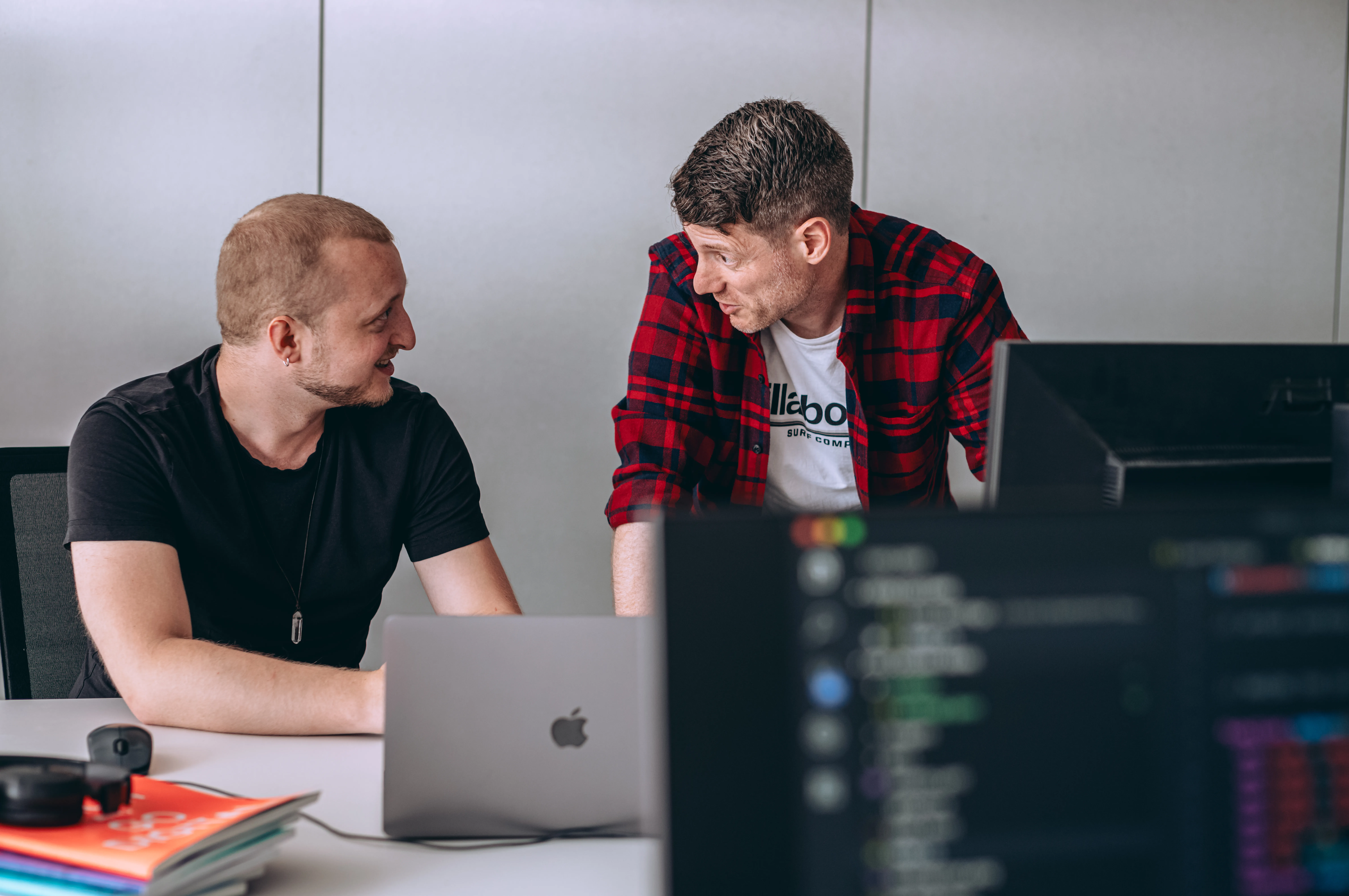 colleagues working together to build a retail app