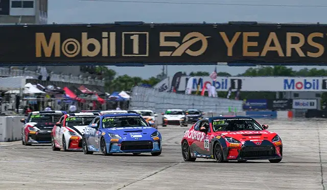 Cars heading down the track