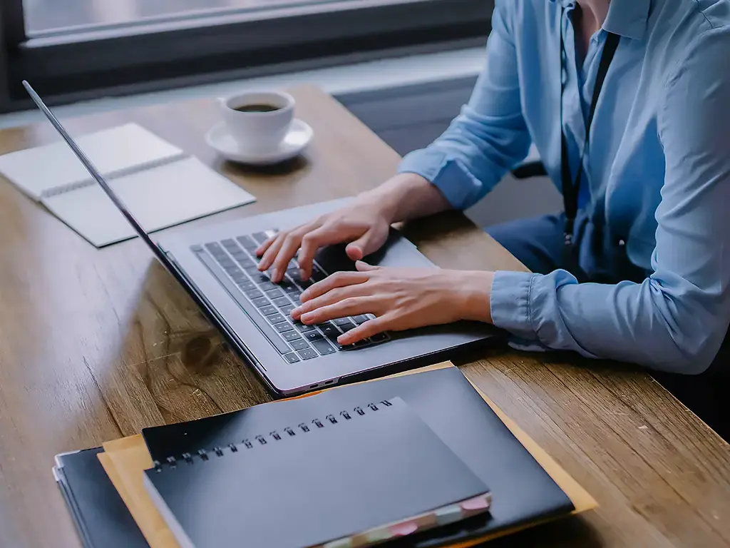 woman-working-on-laptop-marketing-hero